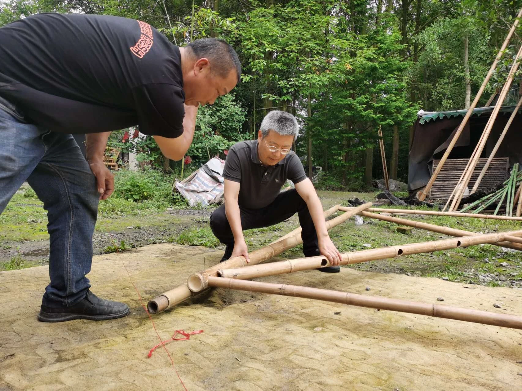 Weibing Liu and a local maker developing the full-scale Wuxing bamboo prototype together